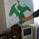 Frank Wu shows me the campaign’s map of Massachusetts’ Eighth Congressional District and explains the diverse mix of communities it includes.